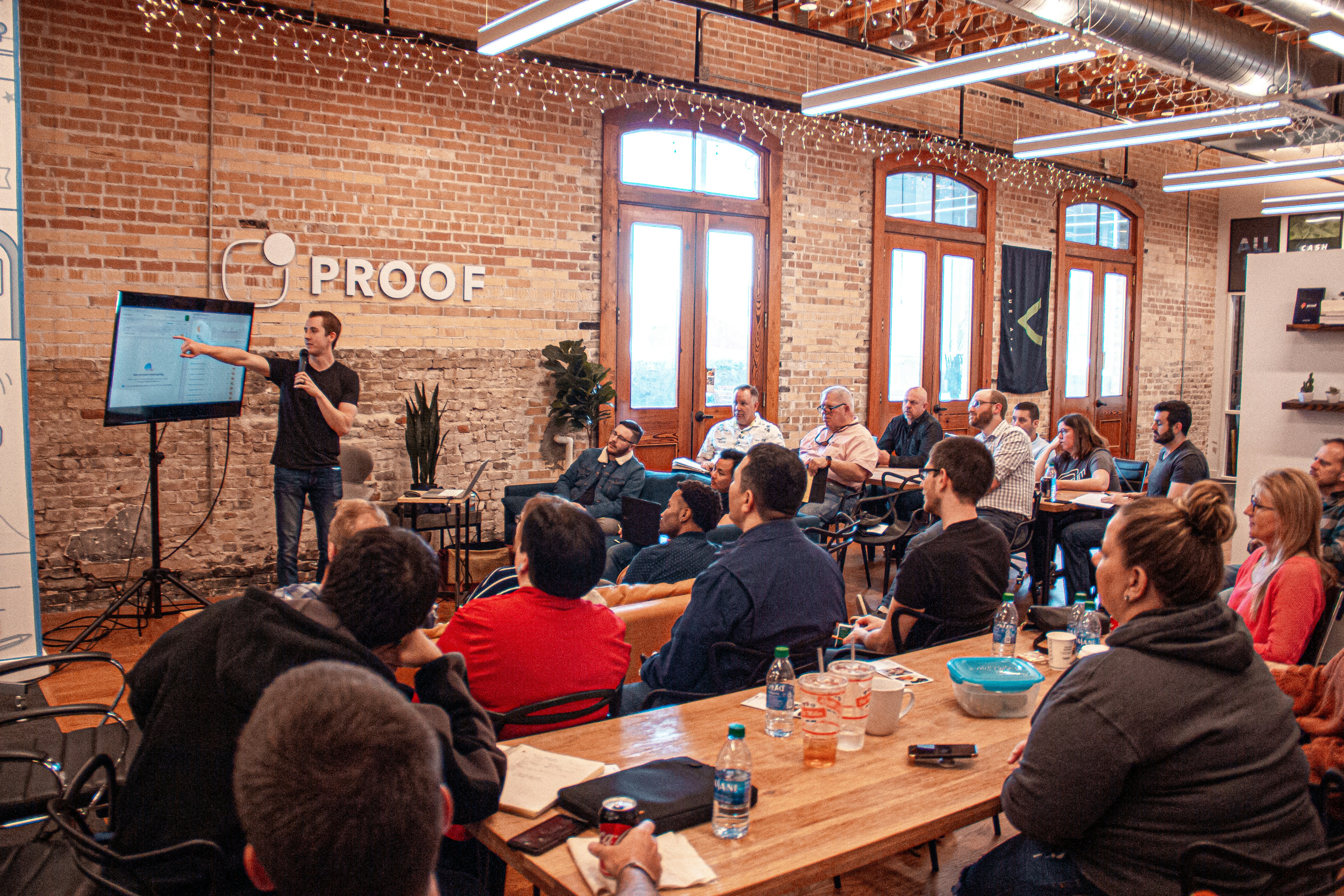 Researcher presenting findings to a cross-functional product team